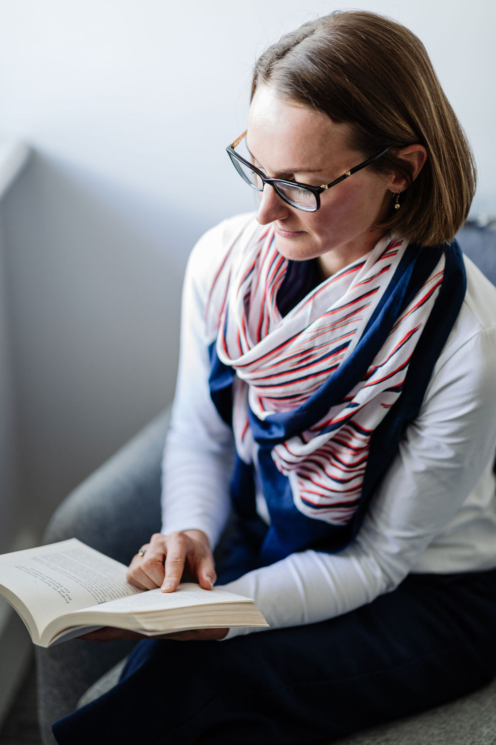 Dr Sarah Davenport reads a book on trauma