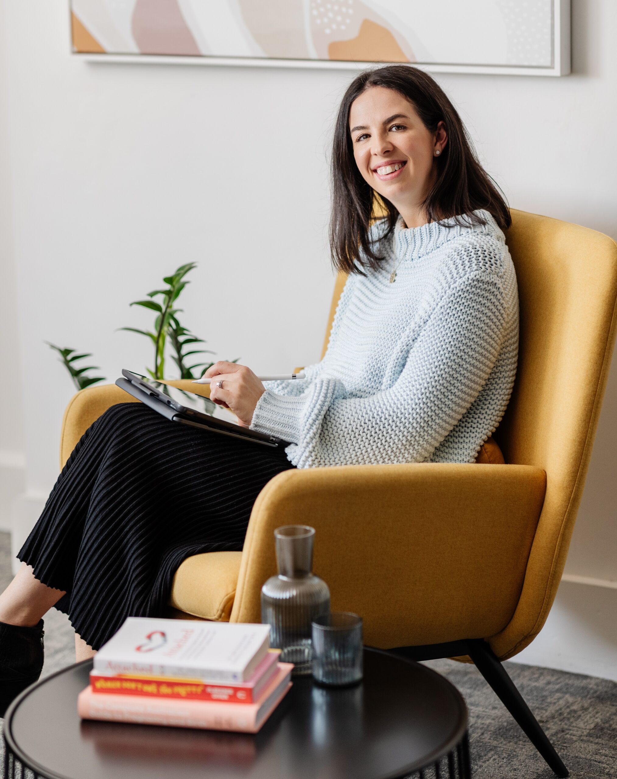 Clinical Psychologist Sally Brookes using an AI scribe in session